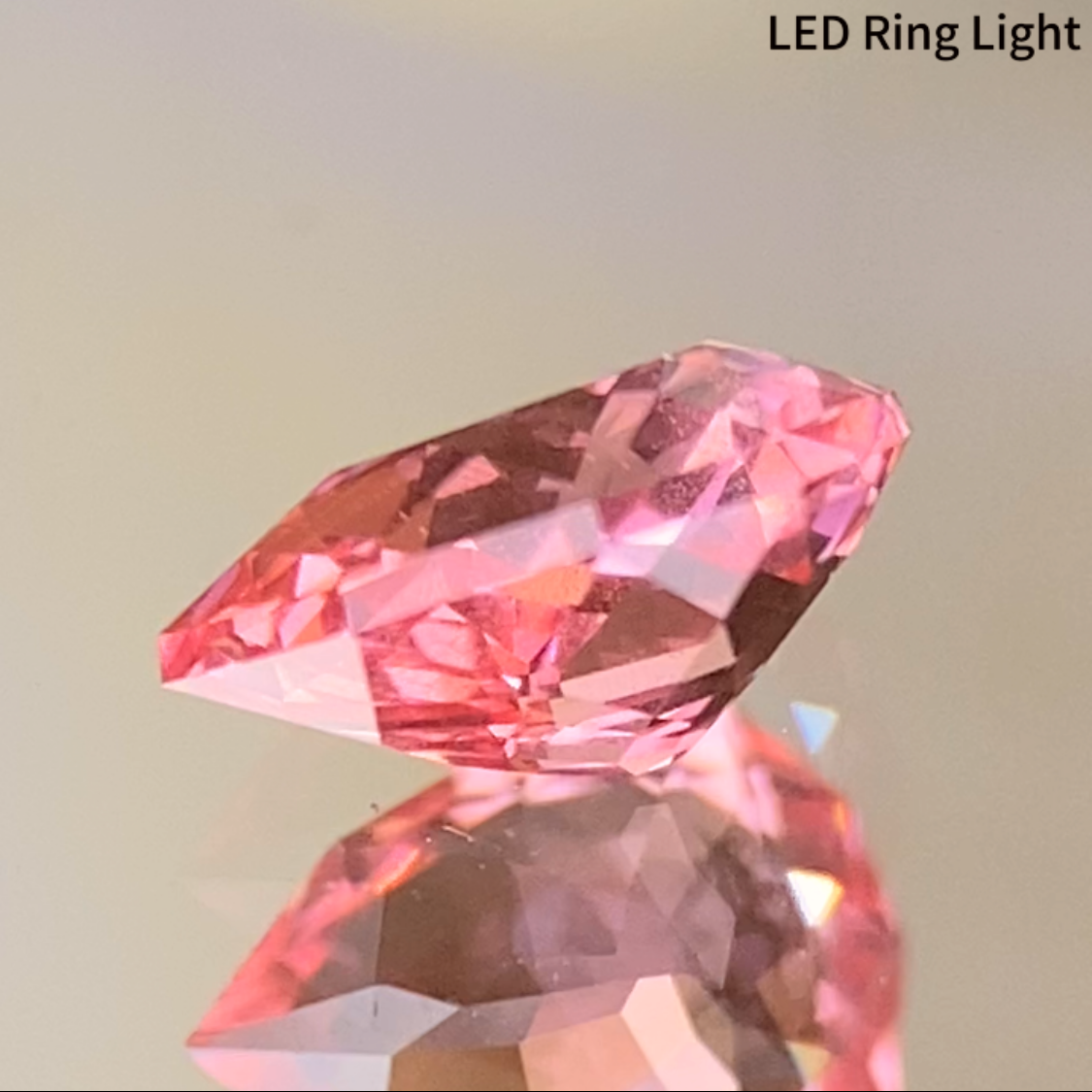 Neon Orangy Pink Spinel 0.615ct / Tanzania: Mahenge