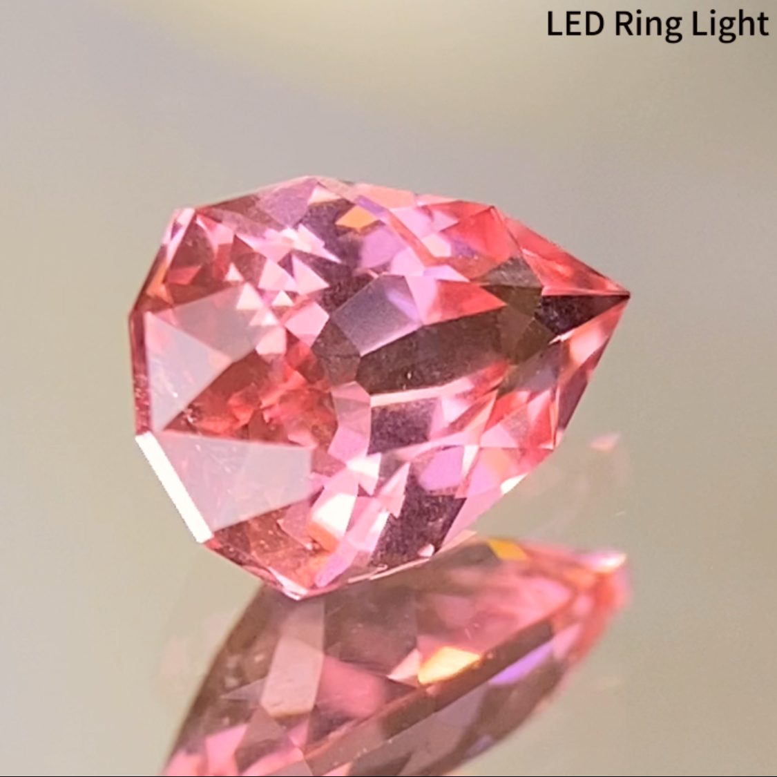 Neon Orangy Pink Spinel 0.615ct / Tanzania: Mahenge