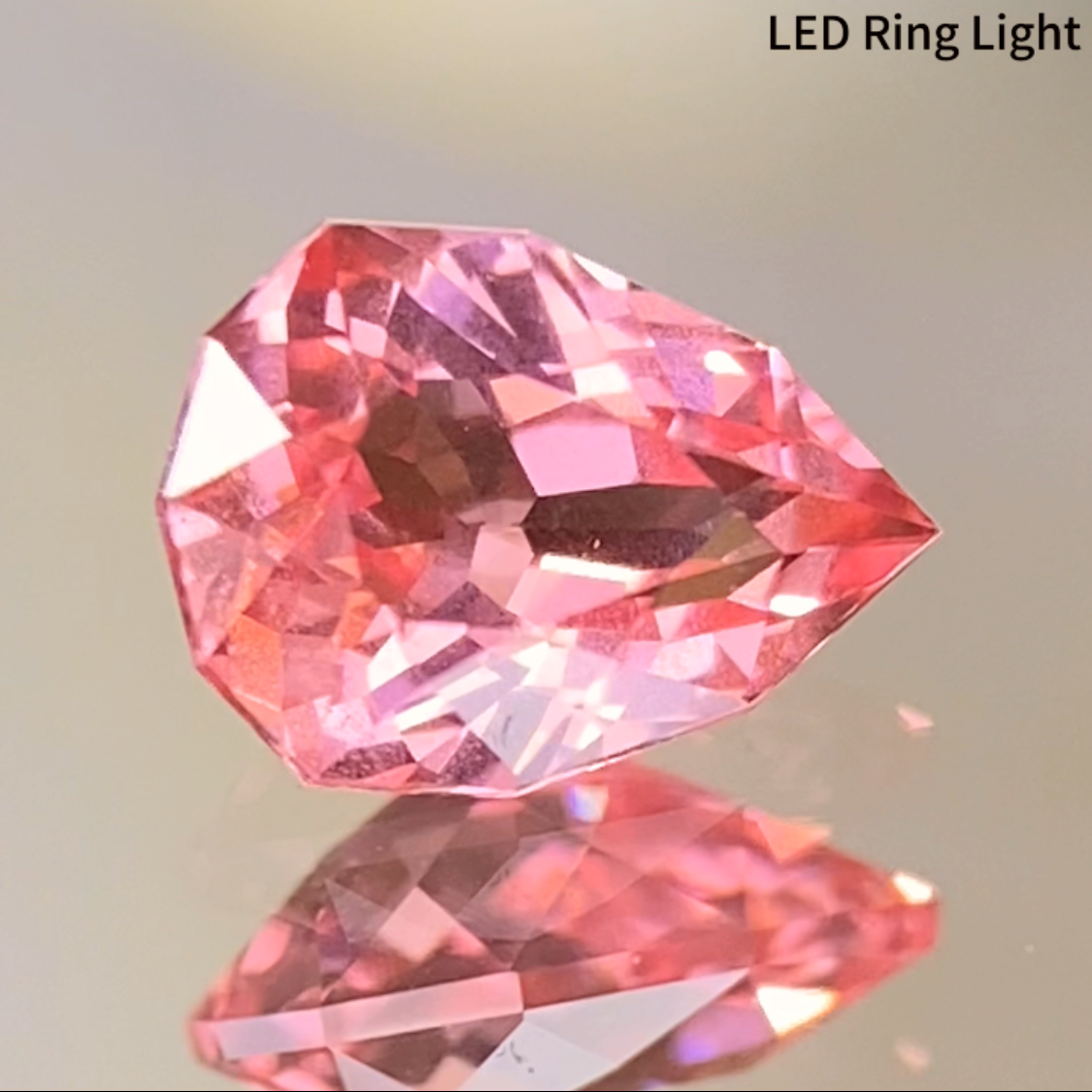 Neon Orangy Pink Spinel 0.615ct / Tanzania: Mahenge
