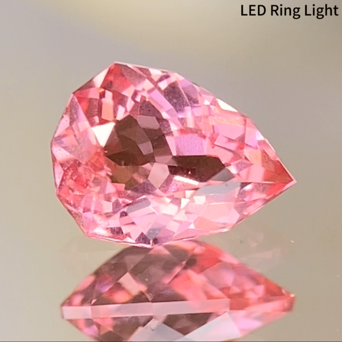Neon Orangy Pink Spinel 0.615ct / Tanzania: Mahenge