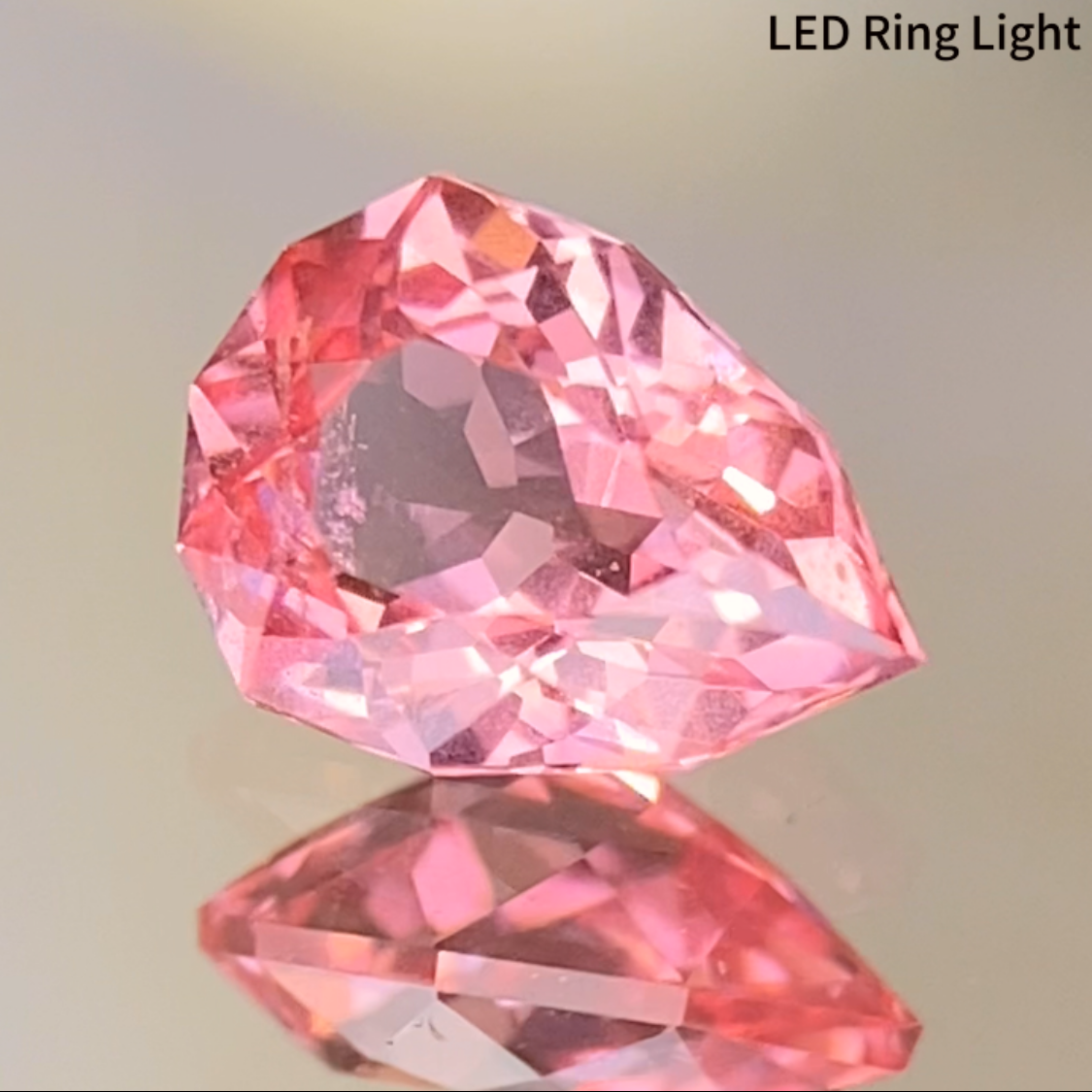 Neon Orangy Pink Spinel 0.615ct / Tanzania: Mahenge