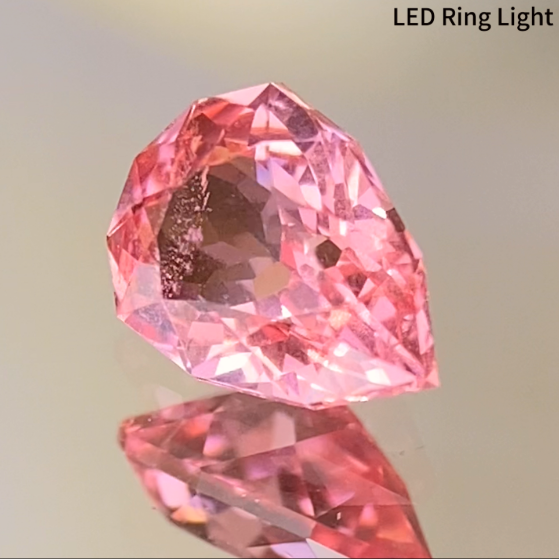 Neon Orangy Pink Spinel 0.615ct / Tanzania: Mahenge