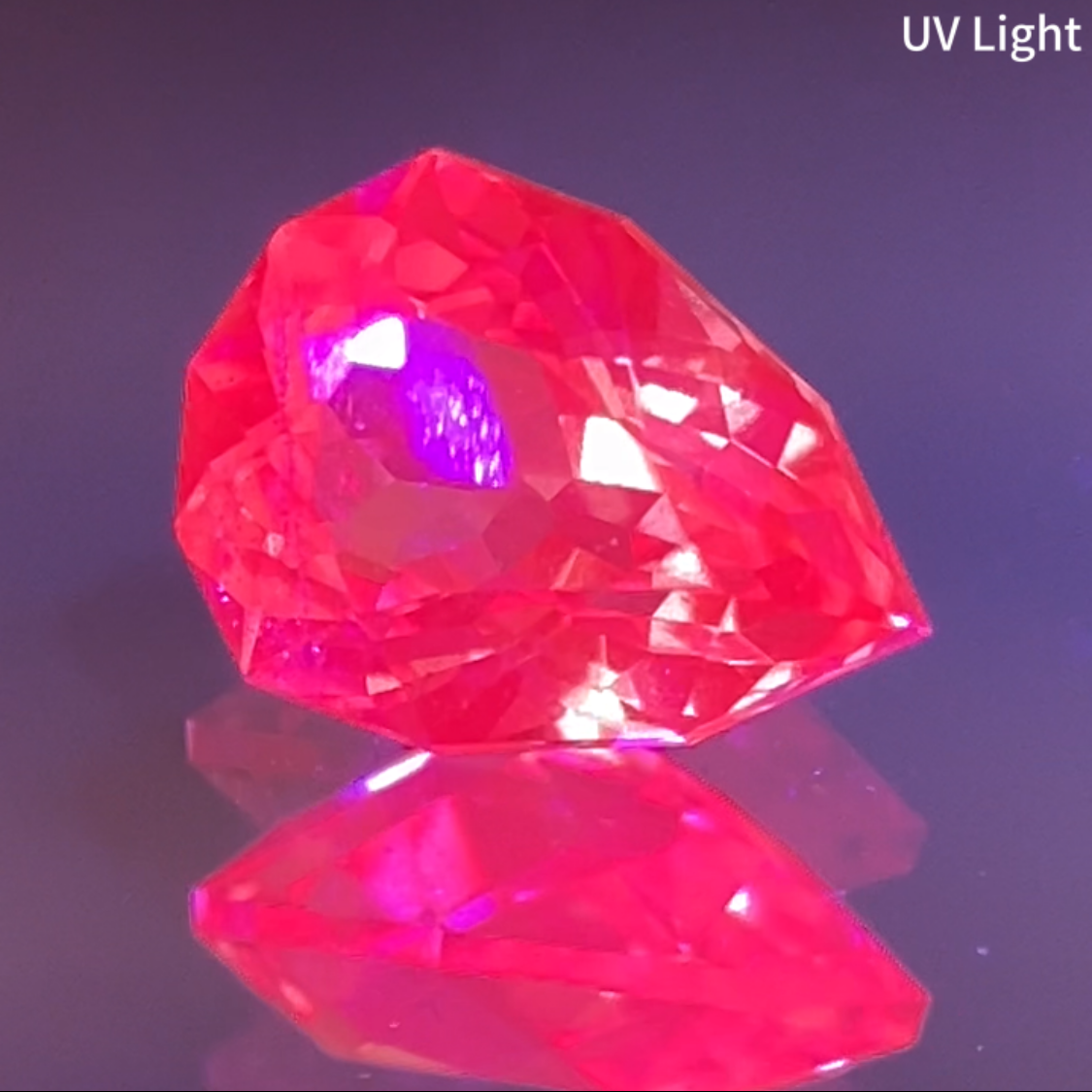 Neon Orangy Pink Spinel 0.615ct / Tanzania: Mahenge